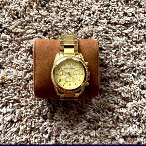Gold with stones MK watch